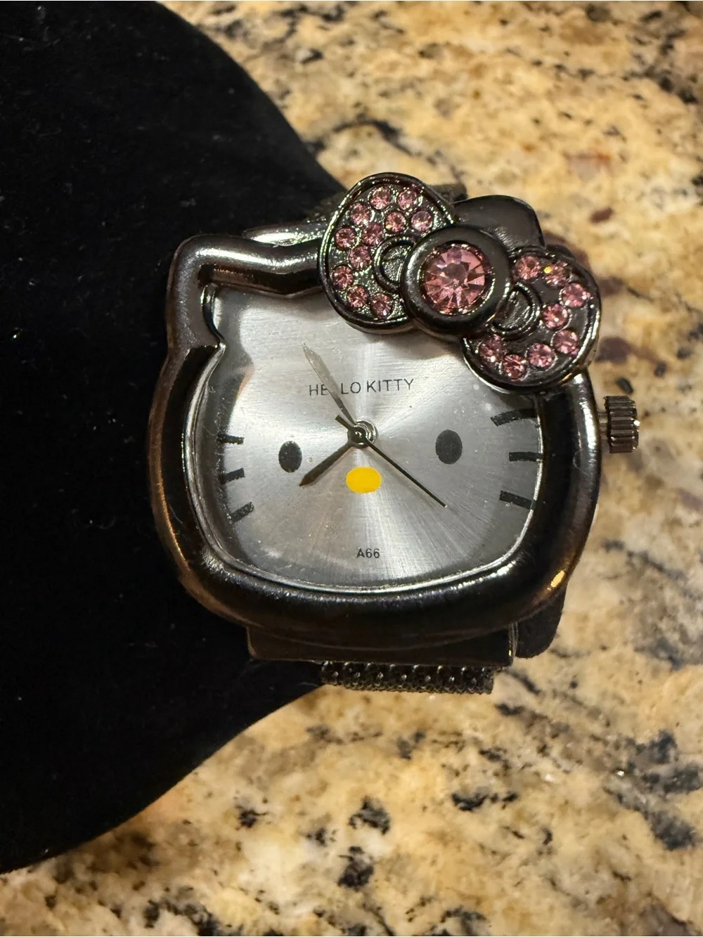 Hello Kitty Silver Face Watch with Pink Crystal Bow Accent